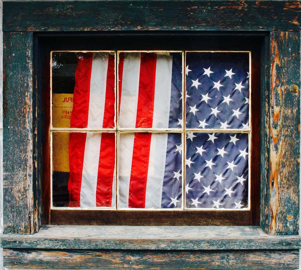 window United States of America flag on window pane flag